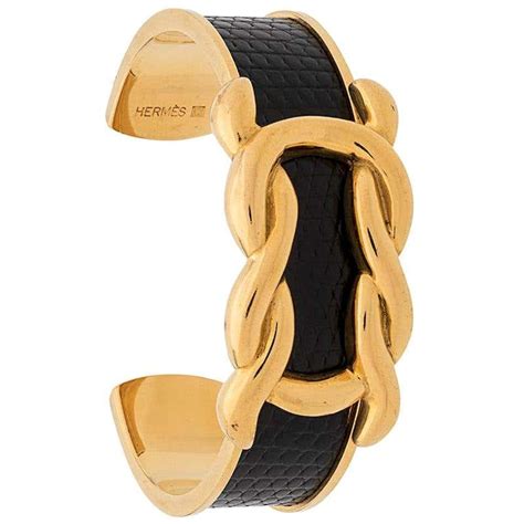 gold and black hermes bracelet|Hermes gold bangle bracelet.